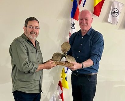 Bob Davis being presented the Malcolm McKay Best Boat Award last year by Narooma Boats Afloat president Graham Peachey. 