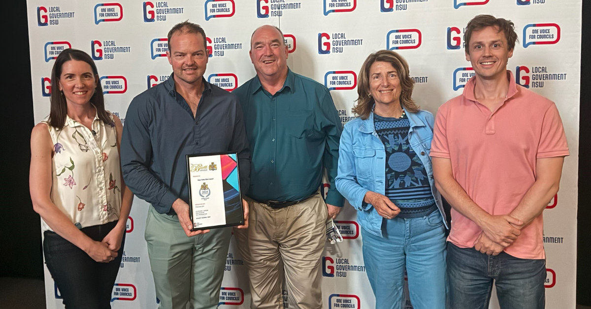 Bega Valley Shire Council's staff and councillors, (from left) Emily Harrison, Anthony McMahon, Russell Fitzpatrick, Helen O'Neil and Mitchell Nadin, accept the prestigious rural/regional category of the 2024 AR Bluett Memorial Award.