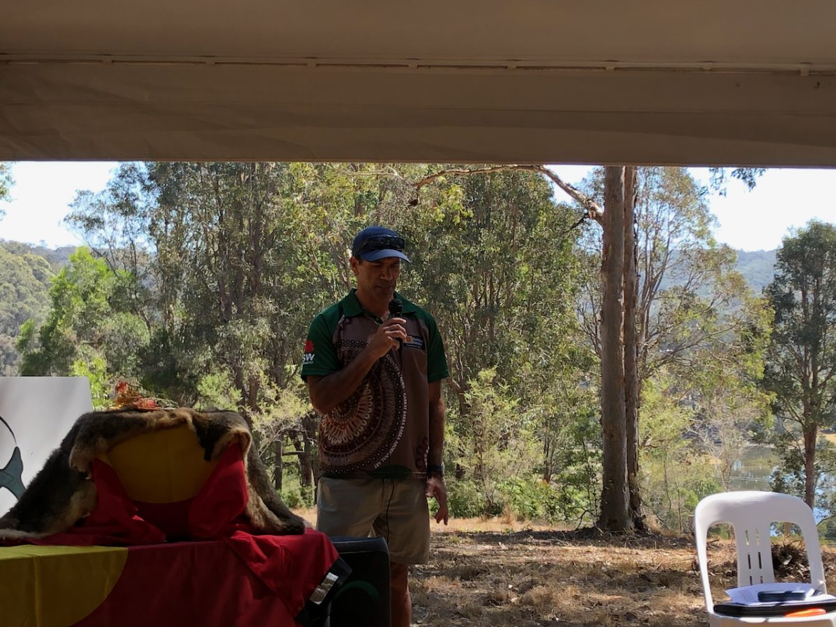 Mark Simon, a member of Heritage NSW's repatriation and conservation team, spoke at the ceremony at Wagonga Inlet on 23 November. 