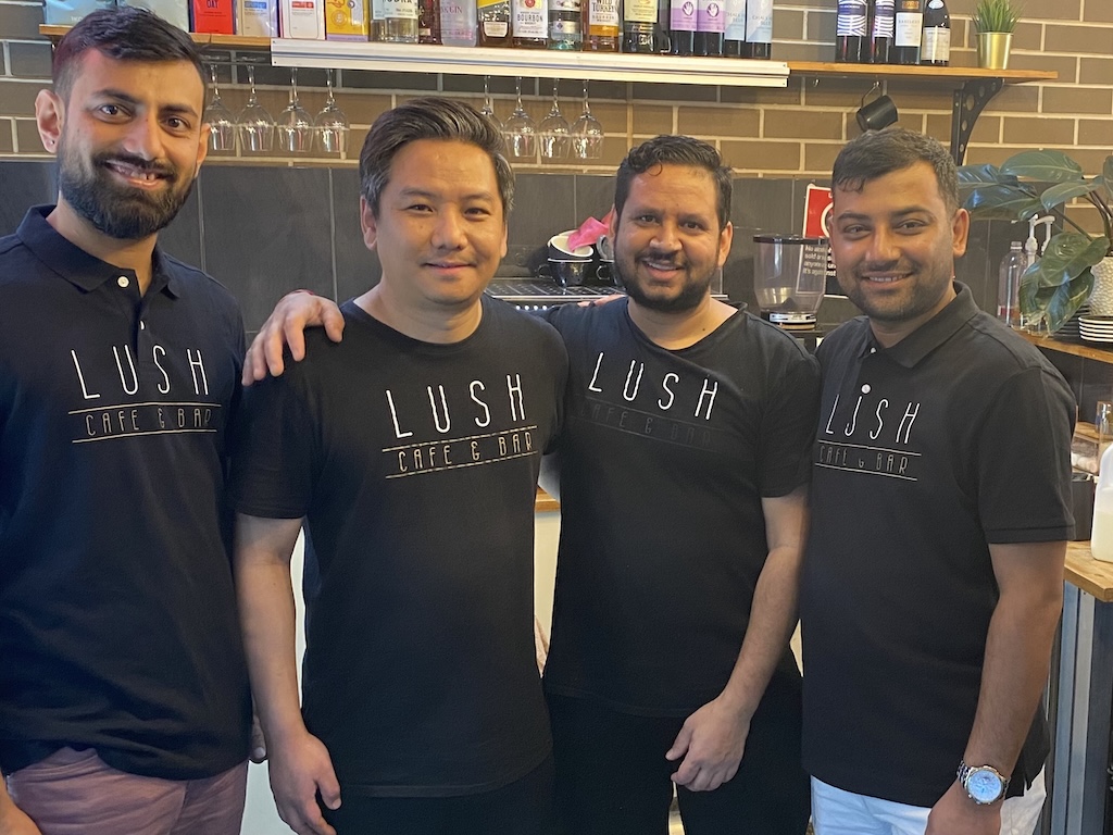 Krishna Bhandari (left) and Basanta Regmi (right) with the founding members of Lush Cafe and Bar, Rajan Gurung and Raj Acharya, who will open the Bluebird Cafe and Bar on 6 December.