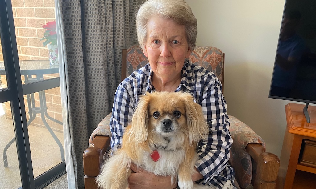 Maxine Elder with her dog Rainer, while reflecting on her years as a maths teacher in Goulburn’s public and Catholic schools.