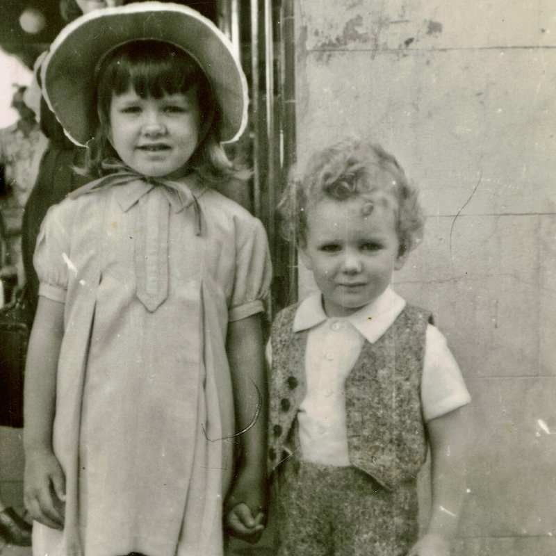 Maxine Muir and her little brother Barry about 1949. After spending her first years at Burrunjuck southwest of Yass she completed her education in Wollongong and in Sydney before becoming a maths teacher. 