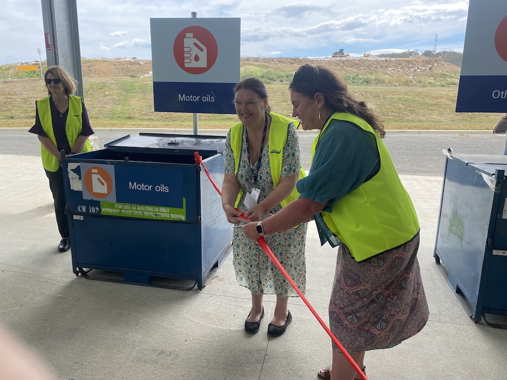 Mayor Nina Dillon and Assistant Minister for the Environment Trish Doyle cut a ribbon to formally open the Community Recycling Centre.