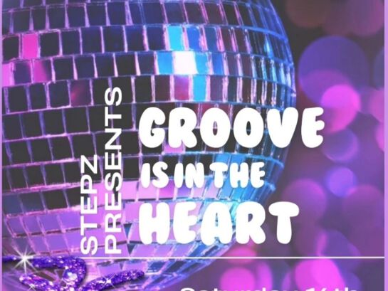 Advertising banner for the groove is in the heart event showing a disco ball in purple lighting