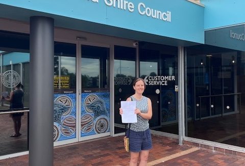 Dalmeny Matters president Sally Christiansen with the petition she presented to Eurobodalla Shire Council on 3 December.