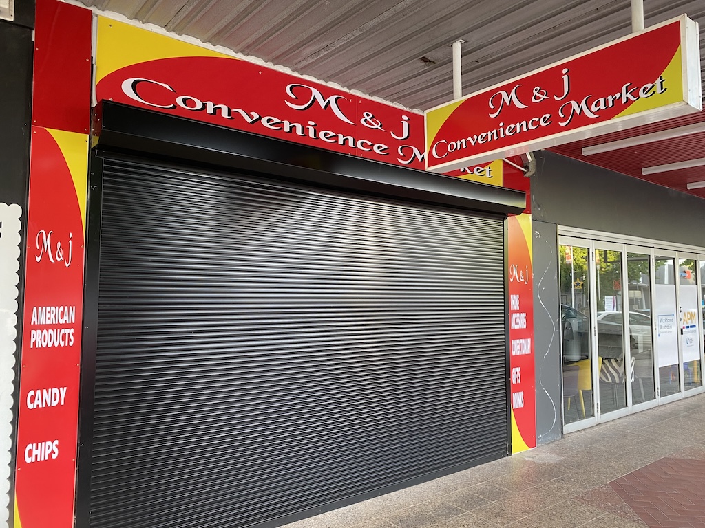 Black shutters used as security on shop fronts in Goulburn’s main street do not meet the heritage city’s guidelines or aspirations for an attractive destination, according to the Goulburn Heritage Group. 