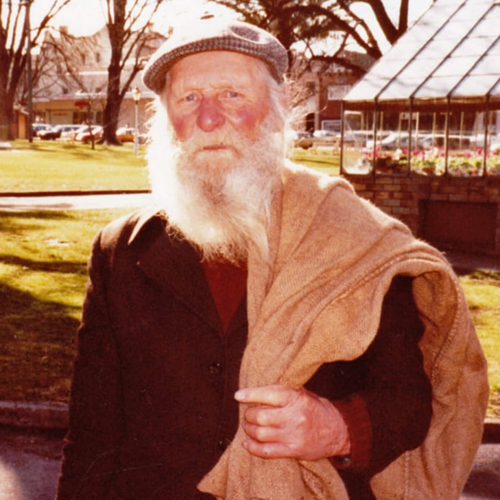 elderly man with a potato sack