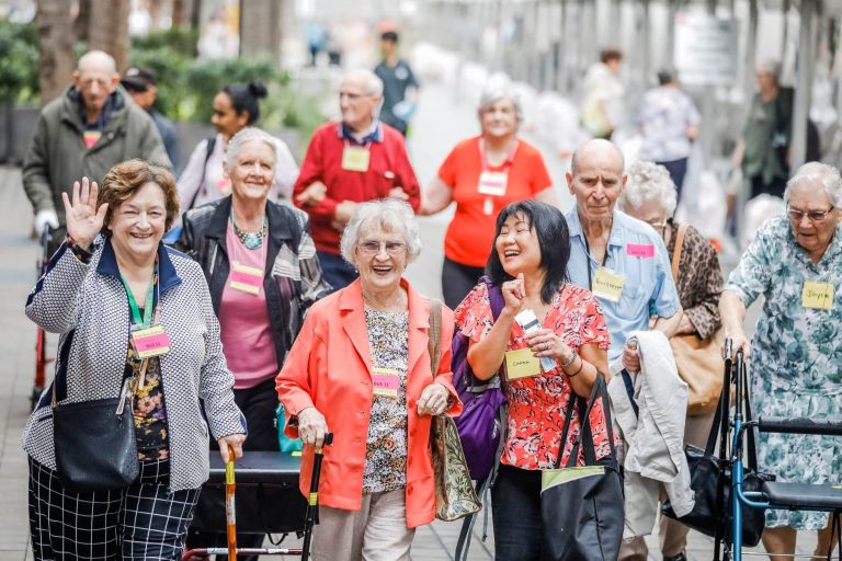 photo of seniors walking down the street