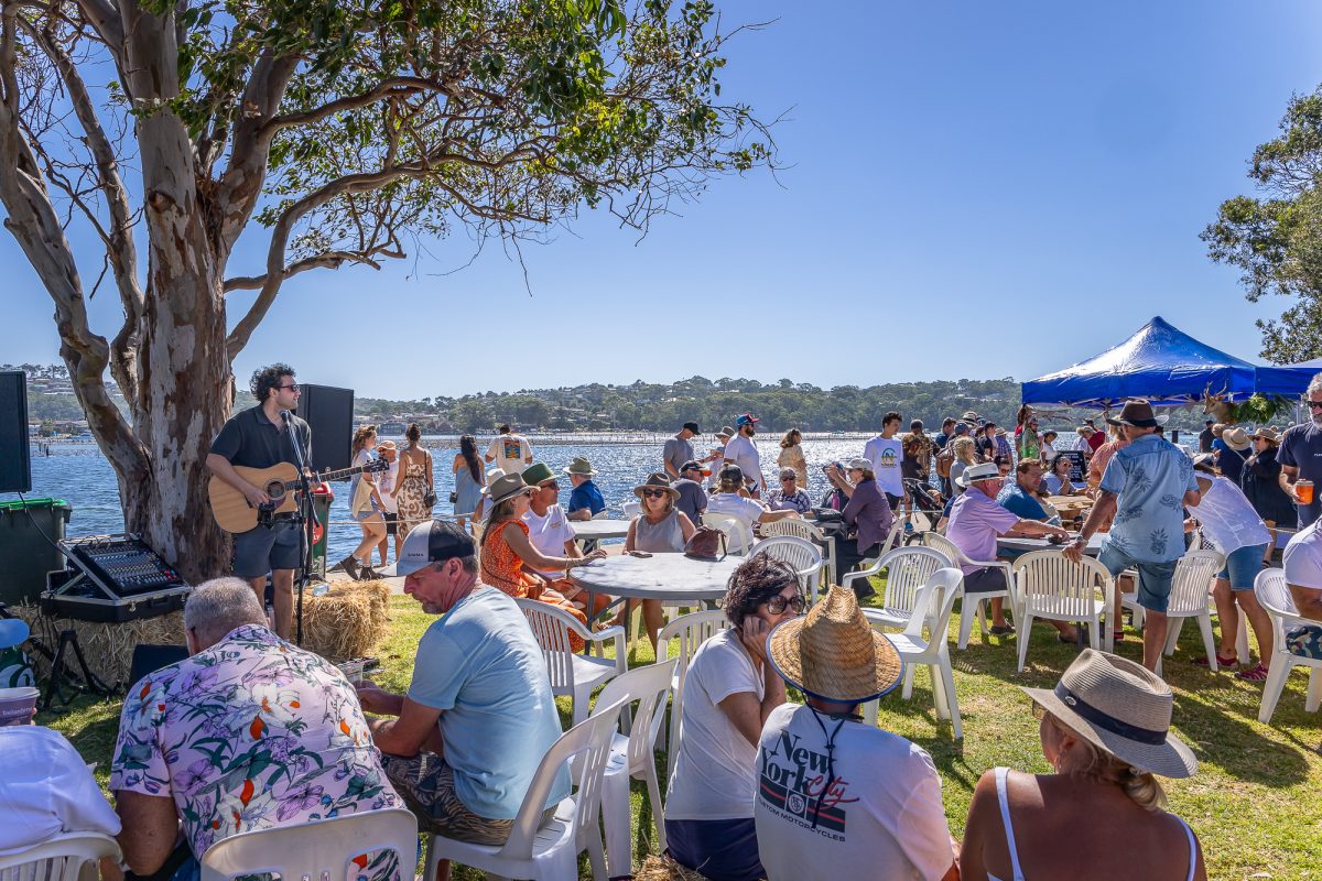 EAT Festival is held on Fishpen Road, against the stunning backdrop of Merimbula Lake's pristine waters. 