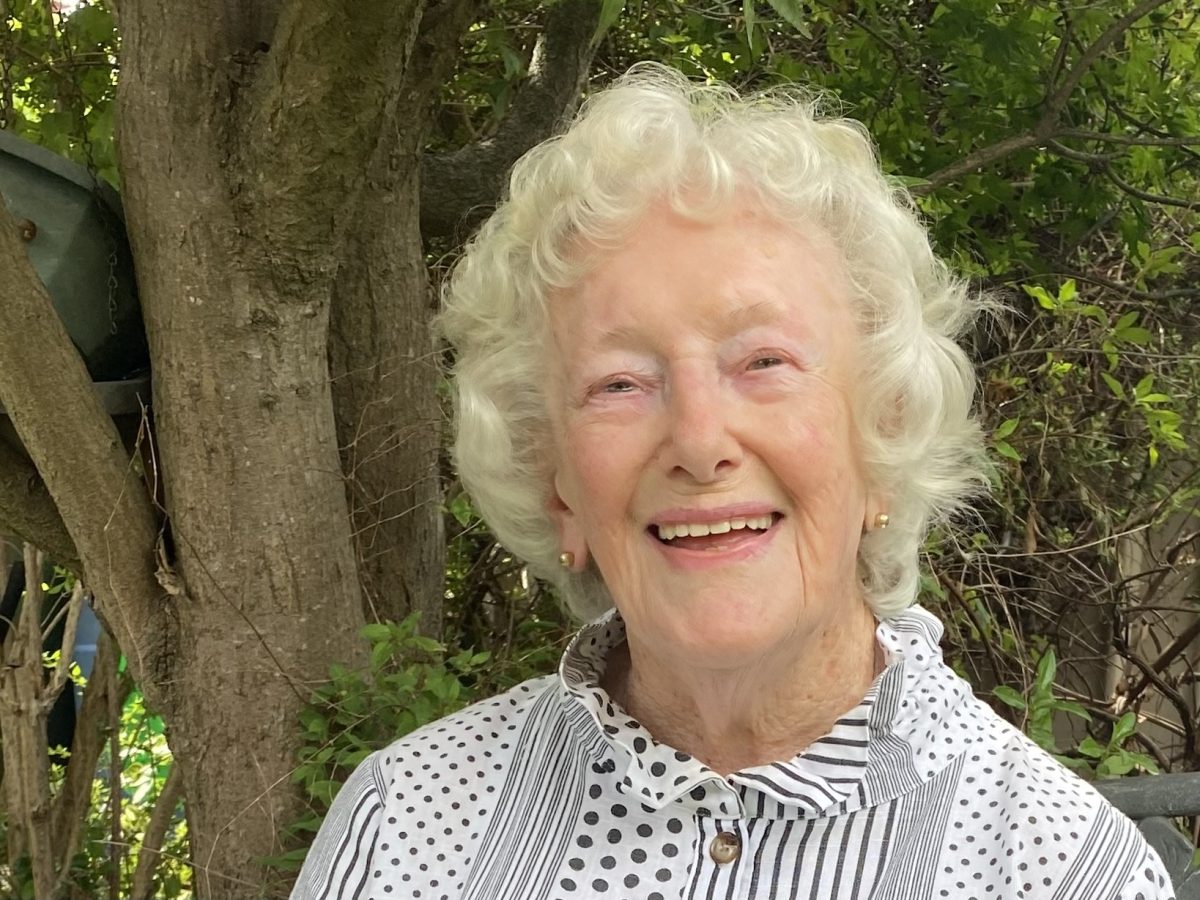 Rita Fry in her North Goulburn garden, where she has an aviary full of birds including zebra finches which remind her of her late husband, Ossie, a keen breeder. 