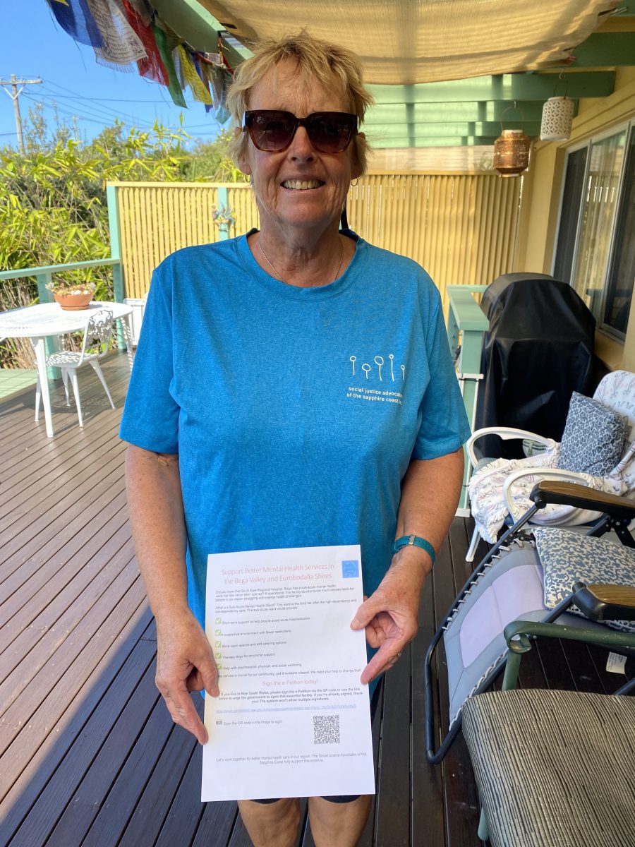 Wendy Wait with the petition about opening the sub-acute mental health unit at the South East Regional Hospital in Bega. 