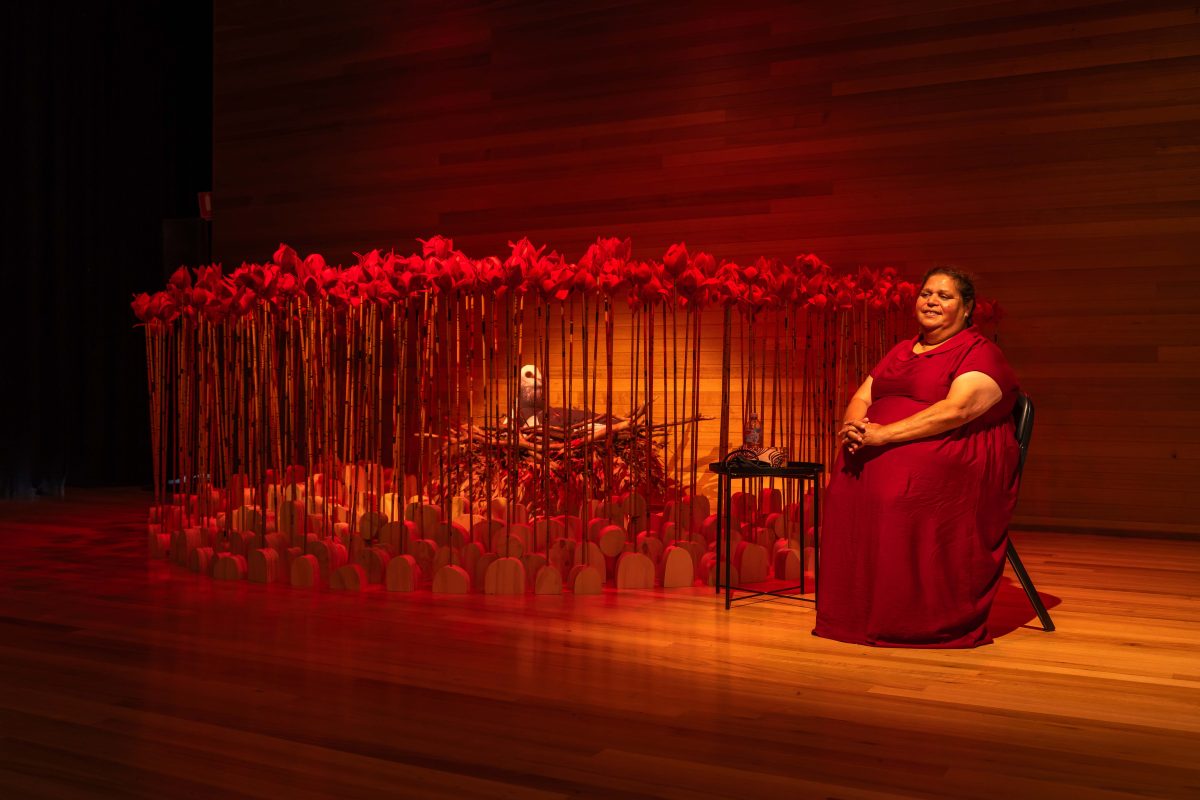 Artist Cheryl Davison with her installation that tells the story about Wonga and the waratahs. 