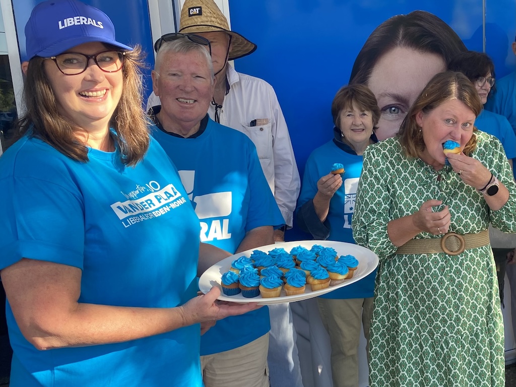 Wendy Weekes hands out a cupcake in party colours to Liberal candidate Jo van der Plaat who wants to take a 6 per cent-plus bite from Labor’s margin in Eden-Monaro at the upcoming federal election. Wendy will manage the Goulburn office during the campaign. 