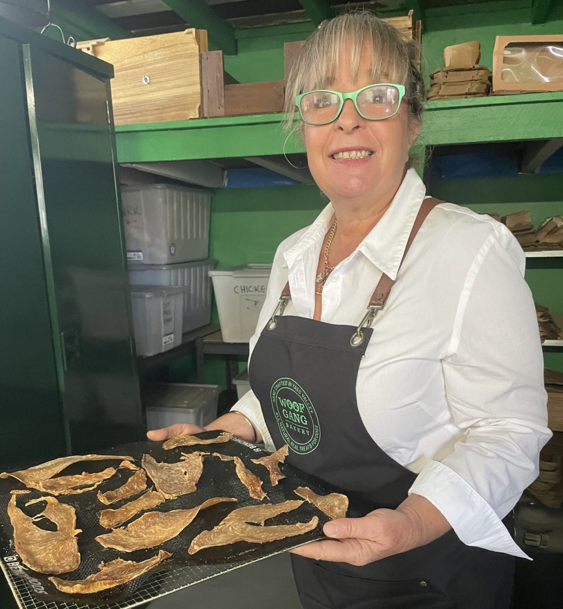 woman holding tray of food