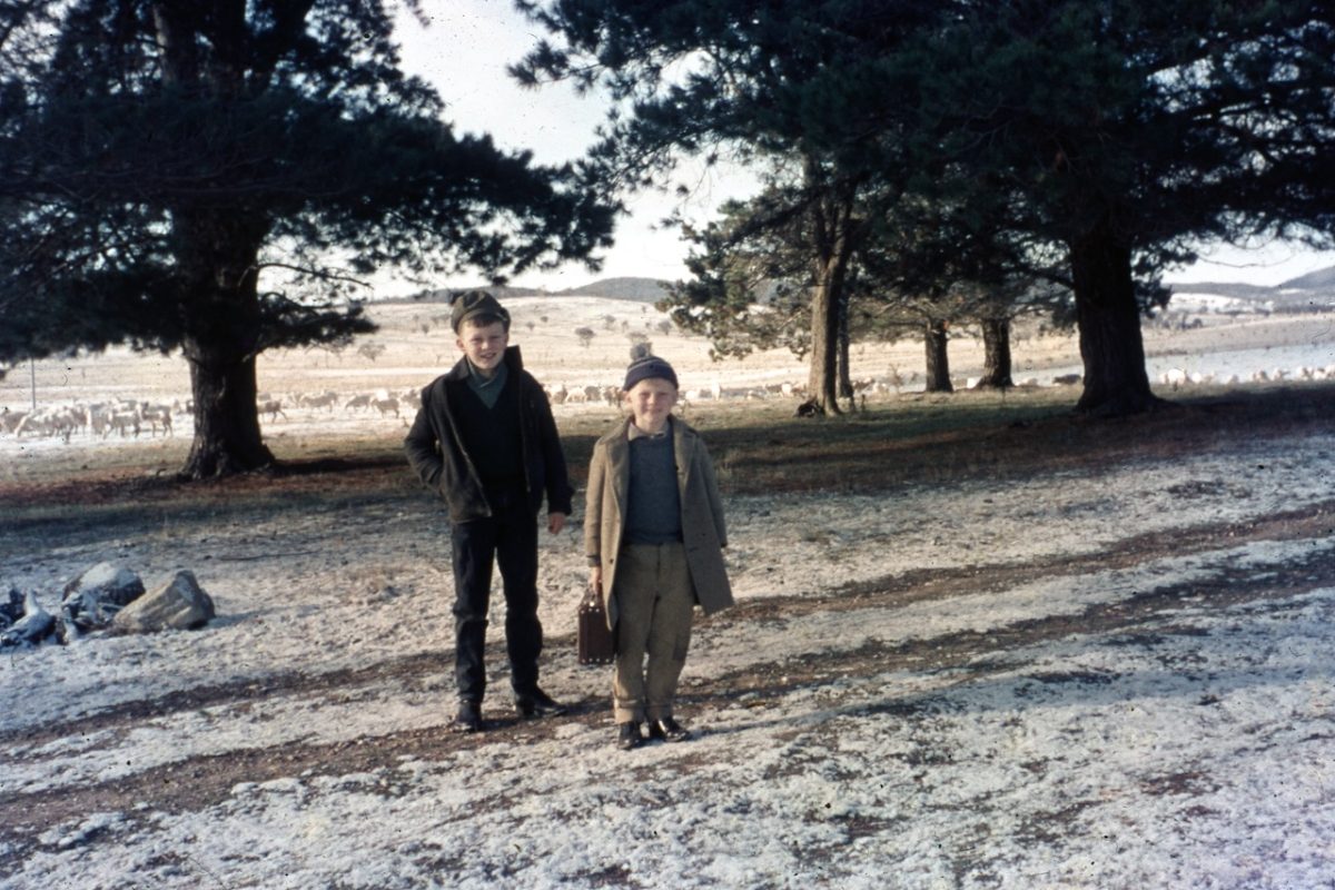 In a dusting of snow Graeme Frazer and his younger brother Norman about to leave their property for Yarra Public School about 1965-66 when Yarra was a railway-stop settlement with two service stations straddling the Hume Highway, just south of Goulburn.