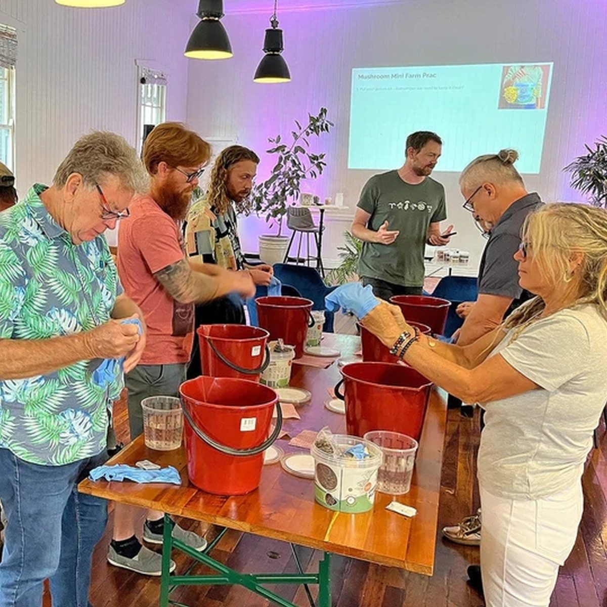 Learning how to grow mushrooms at a workshop by Little Acre Mushrooms, one of the many events scheduled as part of the Fungi Feastival.