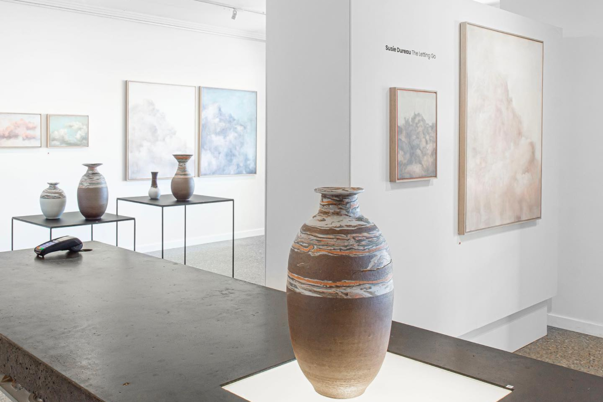 Ceramic urn in art gallery.