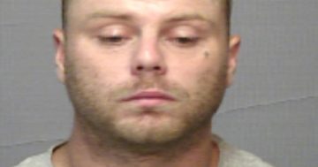 Police hunt for allegedly armed escapee from Cooma prison