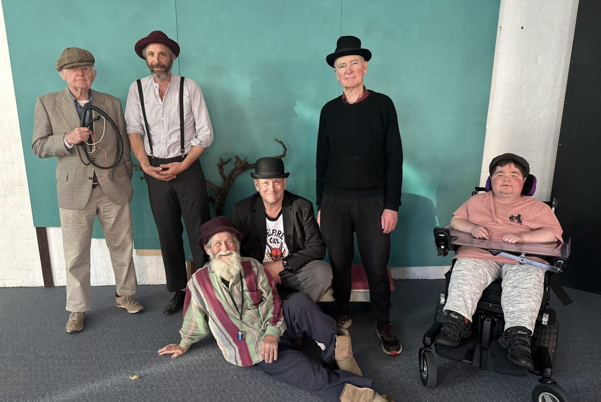 The cast of <em>Waiting for Godot</em>. Standing: Alex Nicol, James Cook and Dennis Stanton. Sitting/lying: David Stocker (director), Jamie Forbes and Lachlan Thomson. 