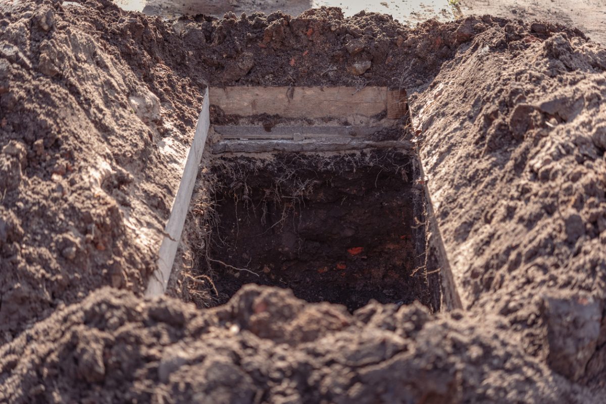 freshly dug grave