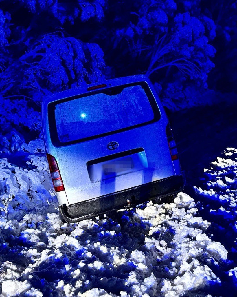 van crashed in the snow