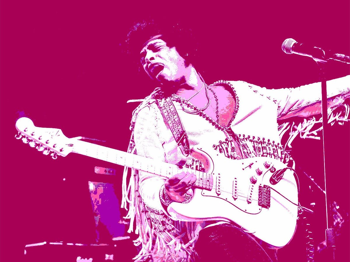 old photo of a singer-guitarist performing