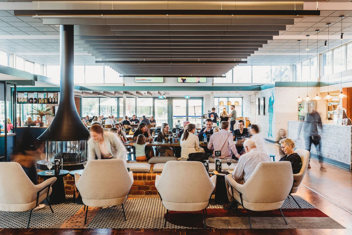 people in a country club dining and lounge area