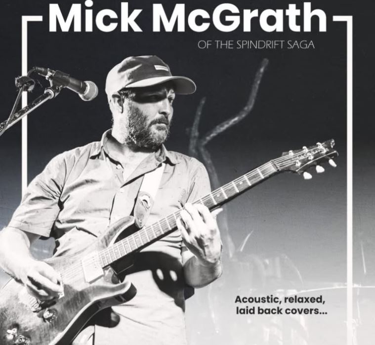 poster of a male singer-guitarist