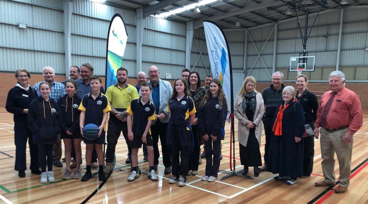 people at the official opening of an upgraded indoor sports stadium