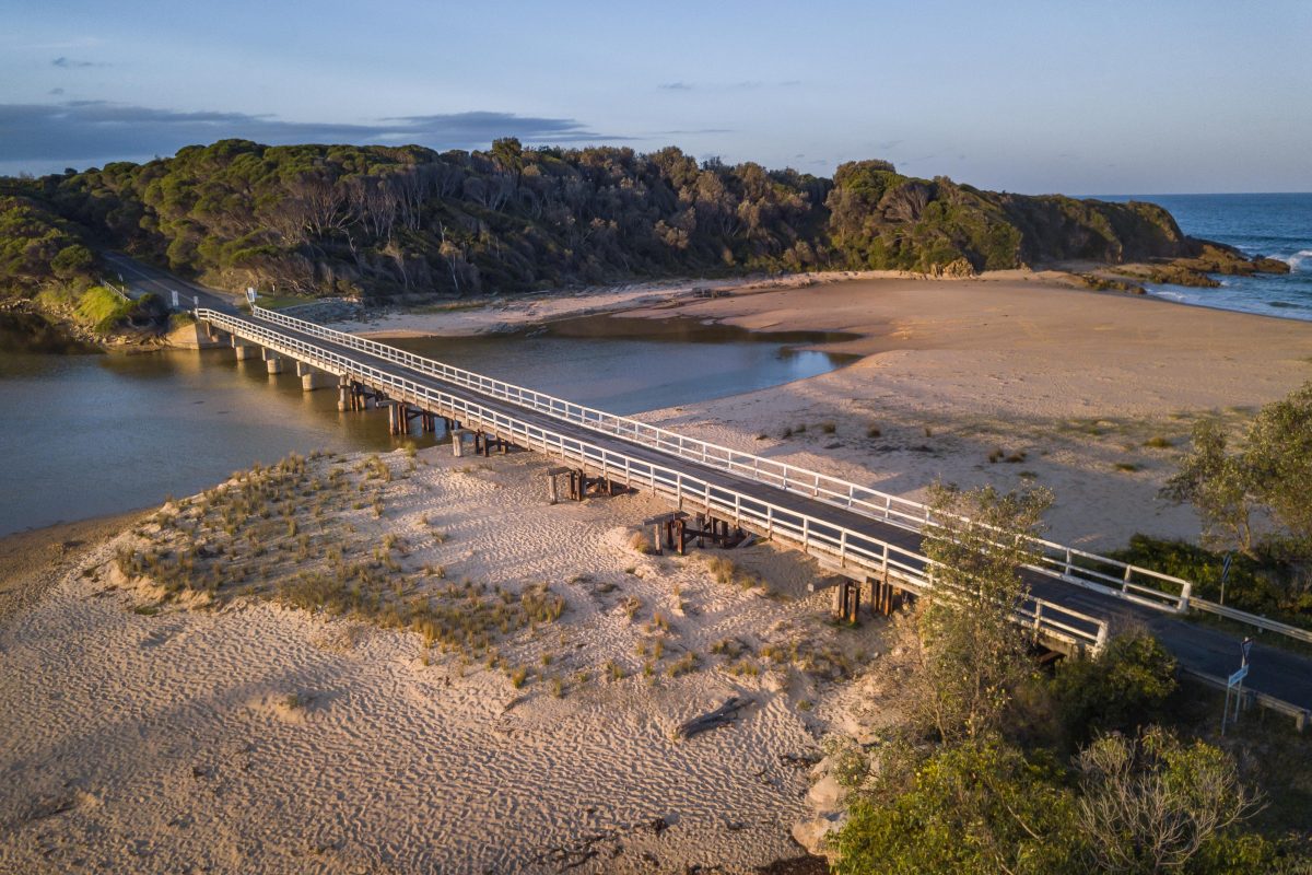 Originally built in 1892, Cuttagee Bridge is a one-lane heritage bridge that requires cars to slow down and take turns to cross. 