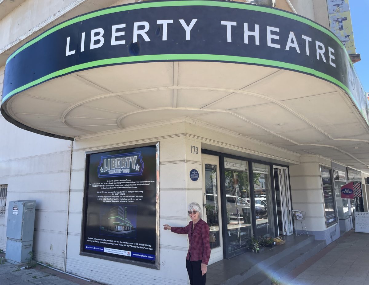 Woman standing outside Liberty Theatre Yass