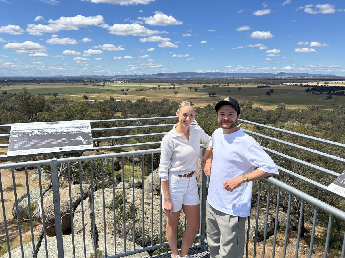 a woman and a man at a rural lookout