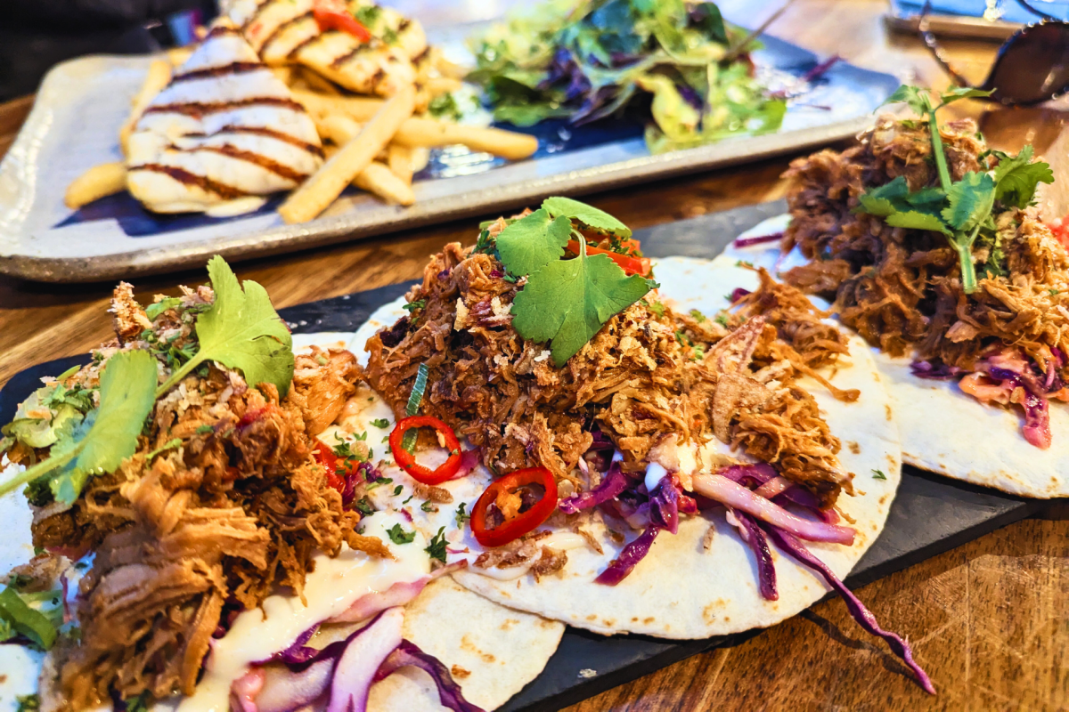 A plate of pork tacos