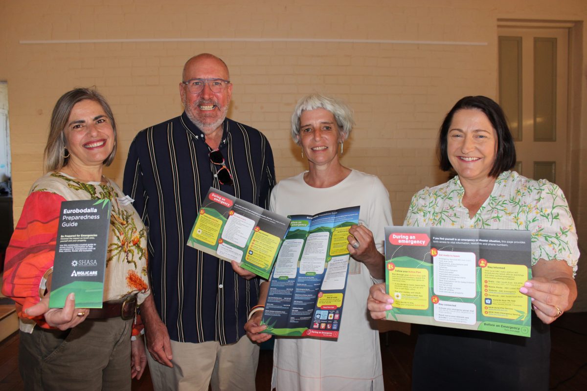 Sandra Makdessi, Dr Brett Henderson, Von Hutcheson and Fiona Phillips MP showing what the Eurobodalla Emergency Preparedness guide looks like.