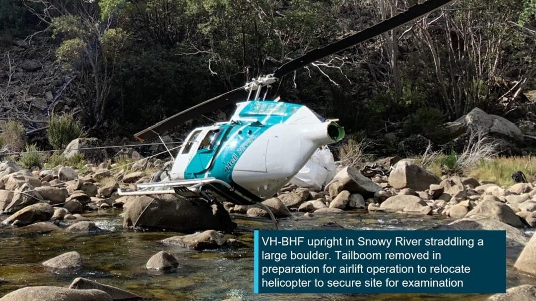 Bell LongRanger helicopter landed over the Snowy River