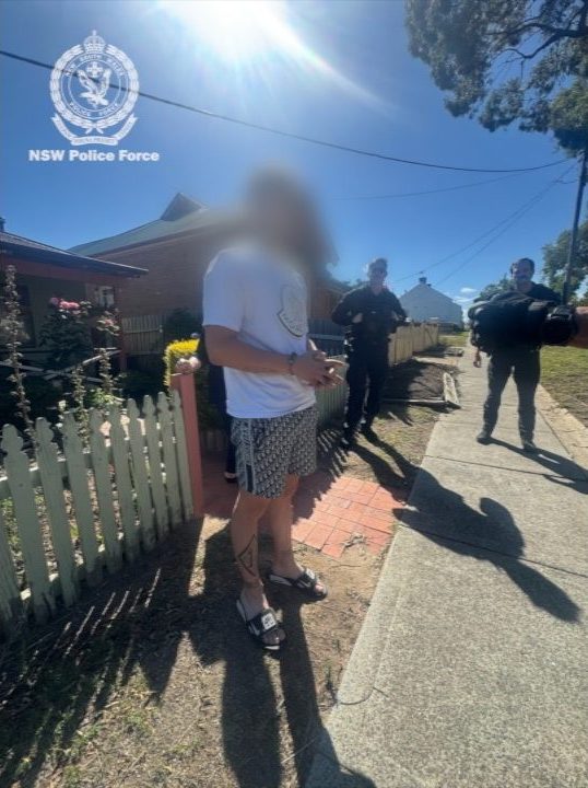 A man with his face blurred