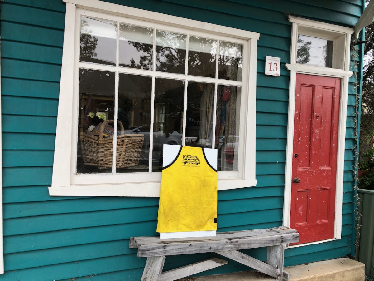 Outside the community space where OzHarvest is running a free community food hub.