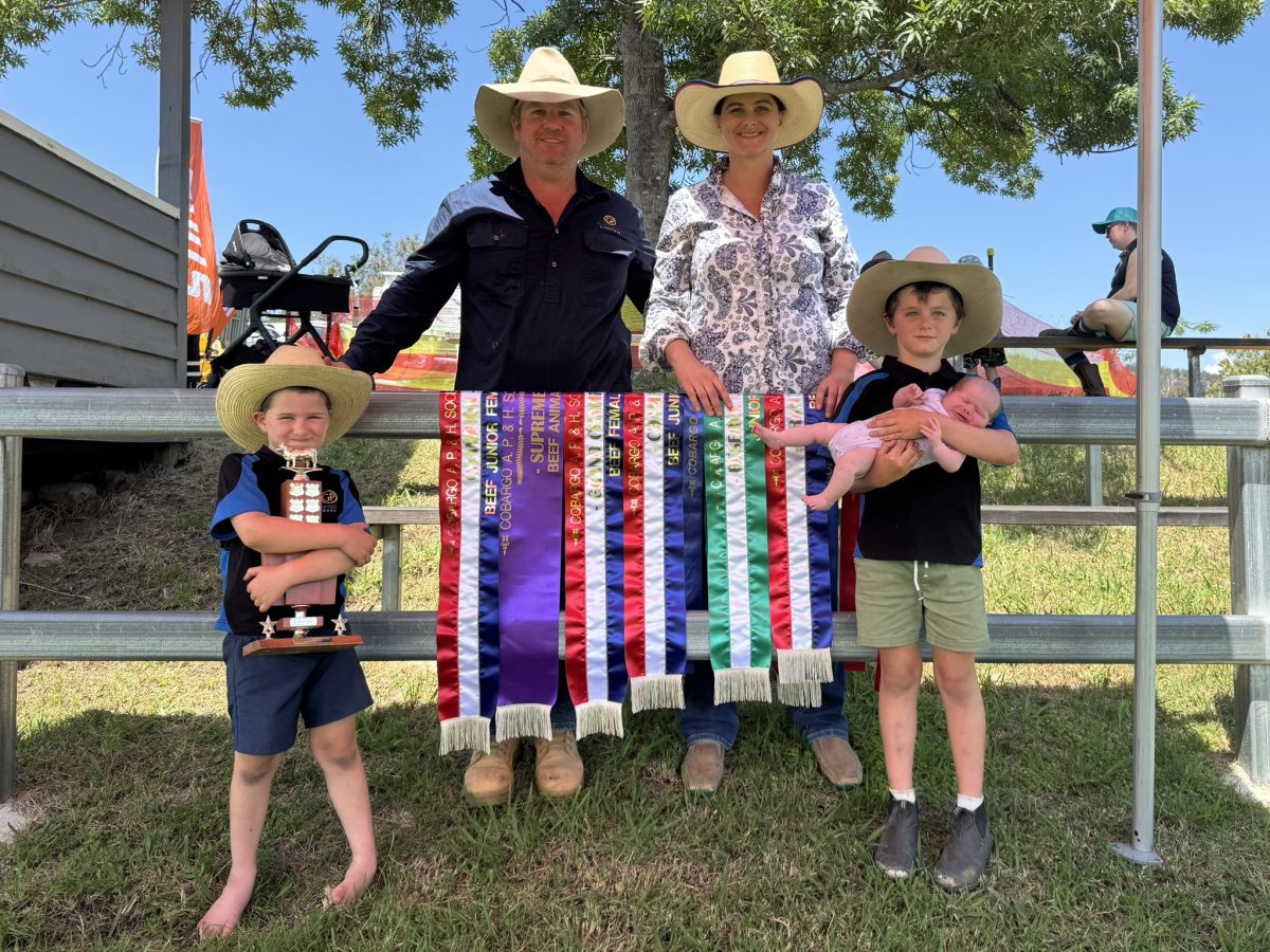 Craig and Tamara Corby and family with some of their prize ribbons.