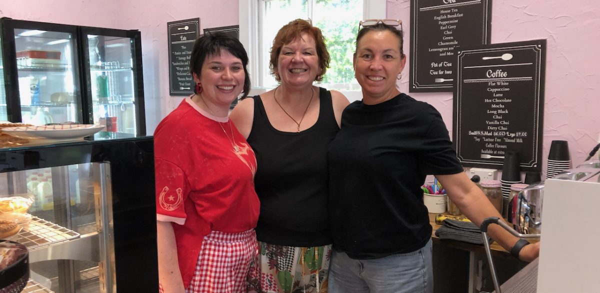 Sharan Callender (centre) with daughter Caity (left) and team member Natalie. 