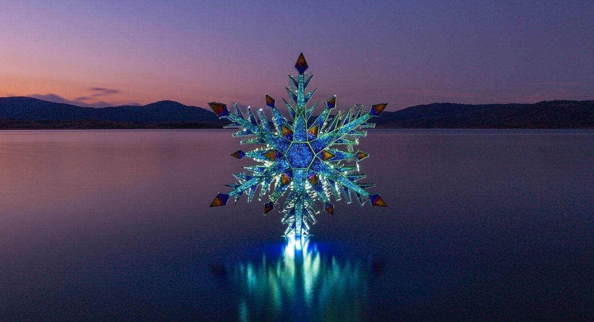 Illuminated sculpture on a lake
