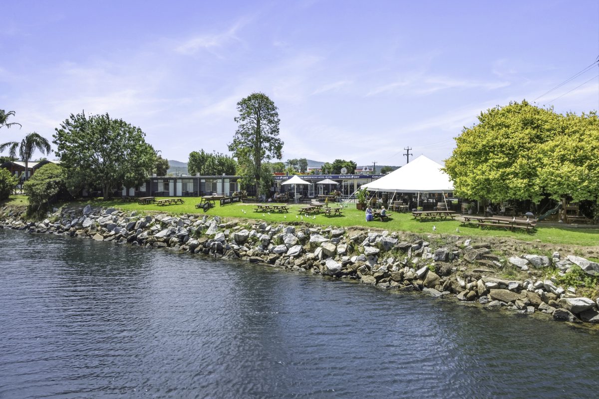 The outside of the hotel, showing the nearby river