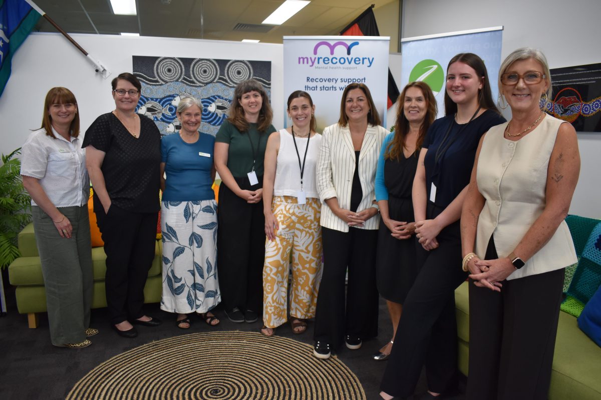 A group of people standing in a line