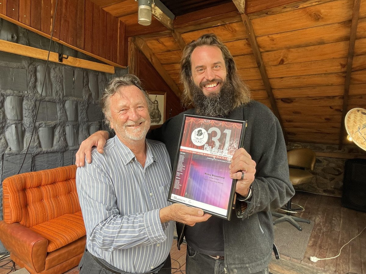 Canberra Area Theatre Award judge Paul Dion presents the CAT Award to Ricky Bloomfield.