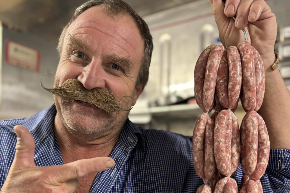 Man holding sausages