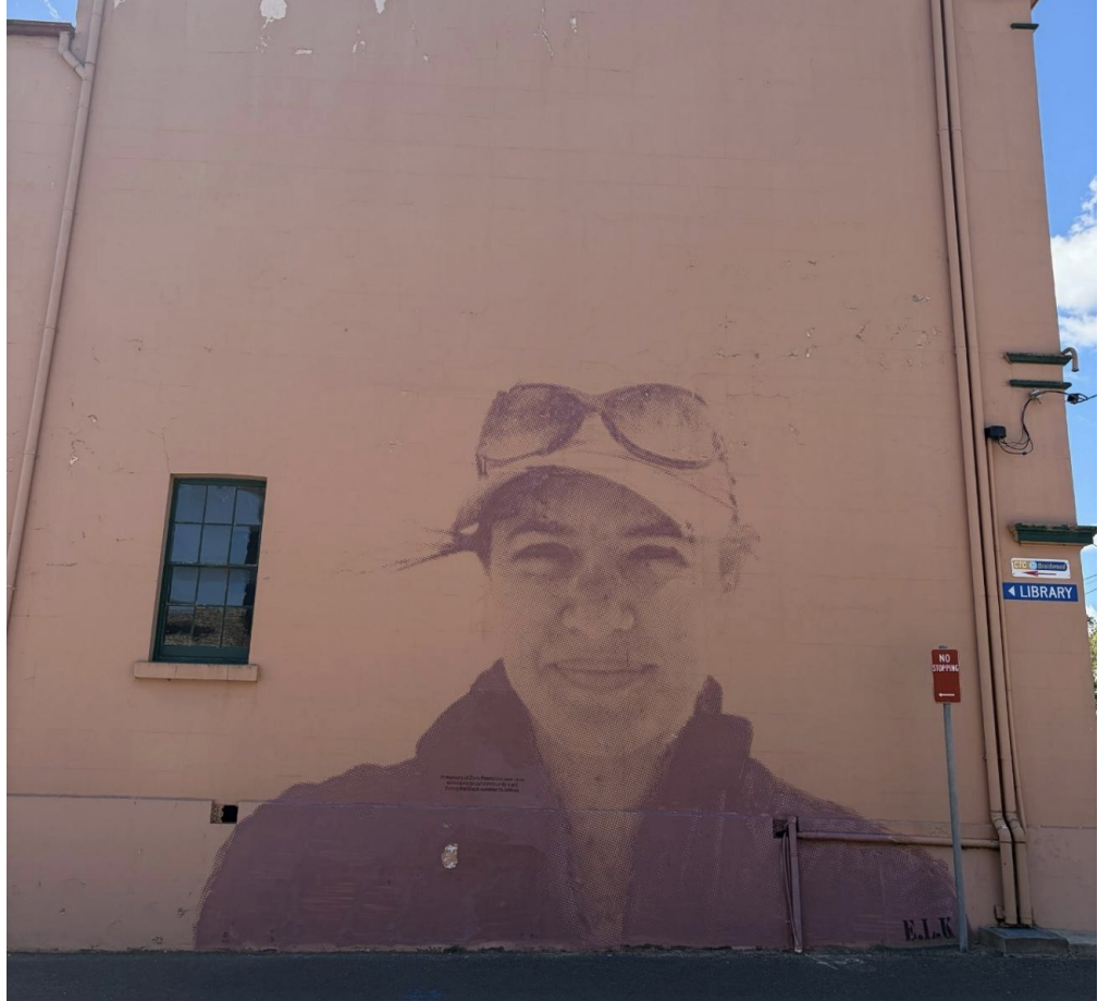 A photograph of a mural of a woman