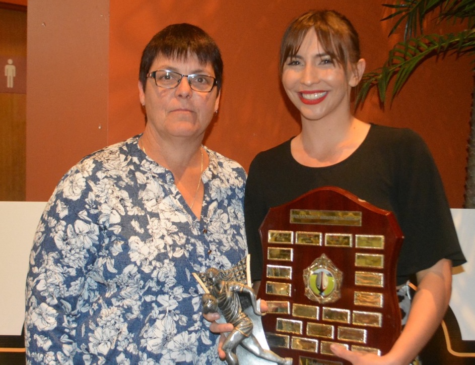 lizzie britt presenting monique luff with award