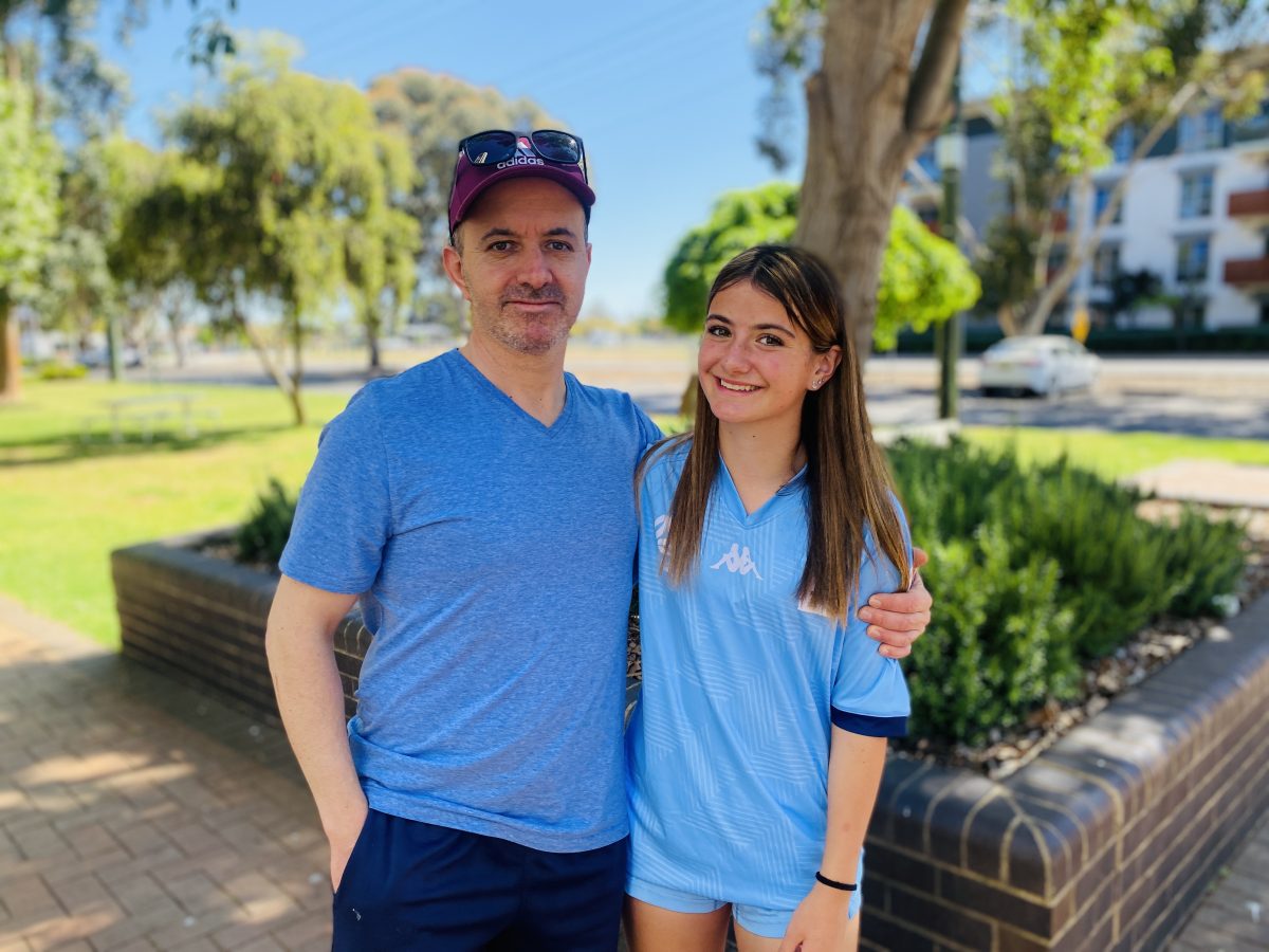 father and daughter in a park