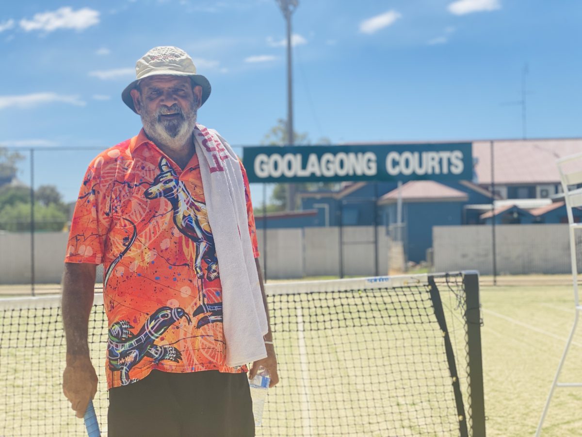 Ian Goolagong on tennis court 