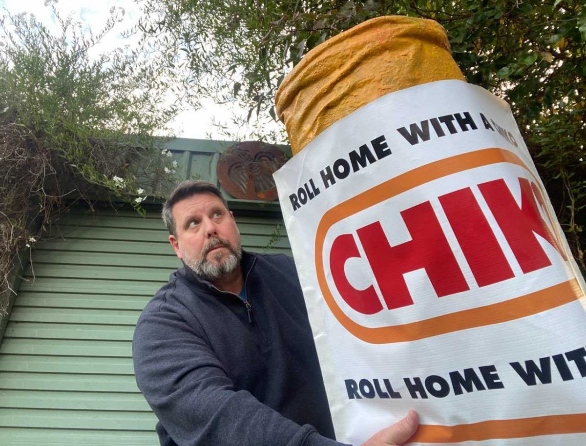 Wagga pop artist Chris with his giant Chiko Roll