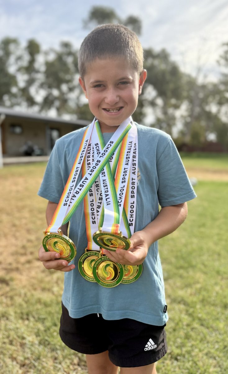 Cody with medals 